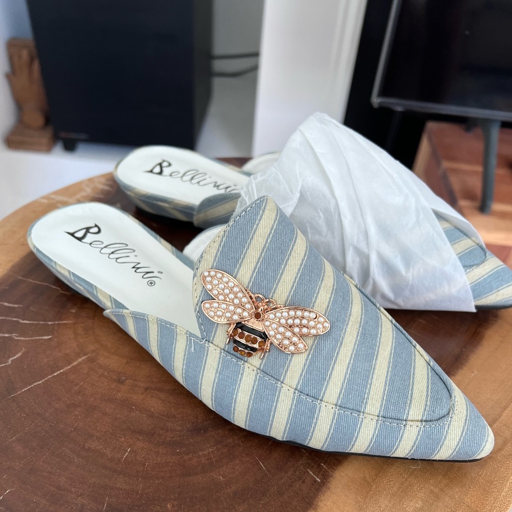 New mules. Flat slides.